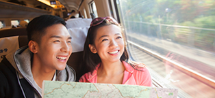 couple traveling by train