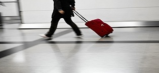 business person walking in airport