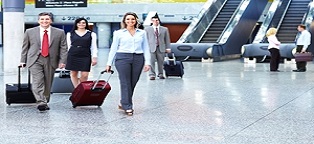 business people walking in airport